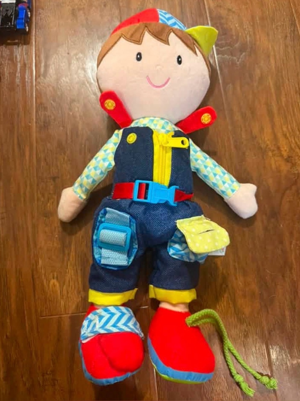 Activity stuffy - buckles, zippers, etc